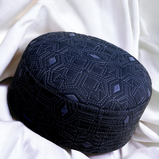 Authentic Al-Banuri Laun Koofi Blue product photograph showing its geometric crown pattern and lower band for orientation checking